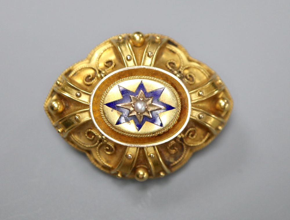 A Victorian yellow metal, blue enamel and seed pearl set oval brooch, 34mm, gross 5.4 grams.